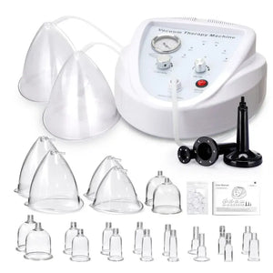 Vacuum therapy machine with various attachments on a white background