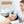 Facial massage procedure with a technician and client in a clinical setting.