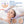 A woman lies on a treatment bed while a gloved hand applies a microdermabrasion device to her face. The image includes explanatory text reading 'Diamon Microdermabrasion Exfoliation' and two circular close-up skin comparison insets.